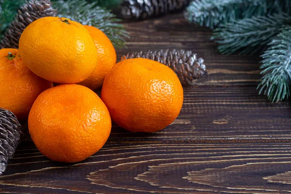 Tangerines Wooden Background Branches Christmas Tree Pine Cones Covered Snow — Stock Photo, Image