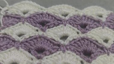 Örgü desenleri, kazaklar, şapkalar ve örülmüş diğer eşyalar için detaylar. El yapımı. Adım adım talimatlar. Metin için boşluk.