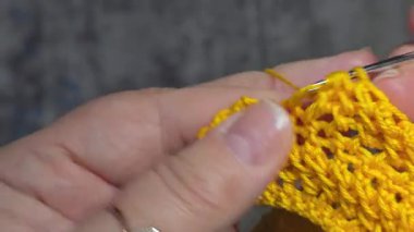 Knitting patterns and details for sweaters, hats, and other items, crocheted and knitted. Handmade. Step-by-step instructions. Space for text.