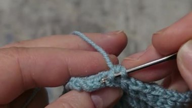 Knitting patterns and details for sweaters, hats, and other items, crocheted and knitted. Handmade. Step-by-step instructions. Space for text.