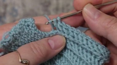 Knitting patterns and details for sweaters, hats, and other items, crocheted and knitted. Handmade. Step-by-step instructions. Space for text.