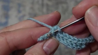 Knitting patterns and details for sweaters, hats, and other items, crocheted and knitted. Handmade. Step-by-step instructions. Space for text.