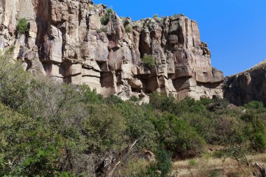 IHLARA, TURKEY - OCTOBER 5, 2020: This is a rocky wall of a volcanic canyon in the Ihlara Valley.