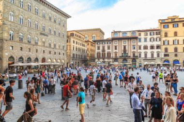 FLORENCE, ITALY - SEPTEMBER 12, 2019: This is the Piazza della Signoria filled with people in the evening.