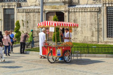 ISTANBUL, TURKEY - SEPTEMBER 11, 2017: This is a characteristically mobile corn and chestnut stall near Istanbul attractions.