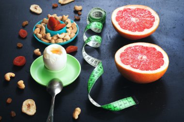 The concept of the classical diet with grapefruit and boiled eggs. Food for fast fat burning