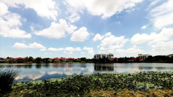 Cloud time lapse reflected in the water — Stock Video