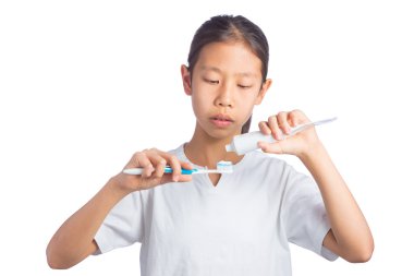 Asyalı kız holding diş fırçası