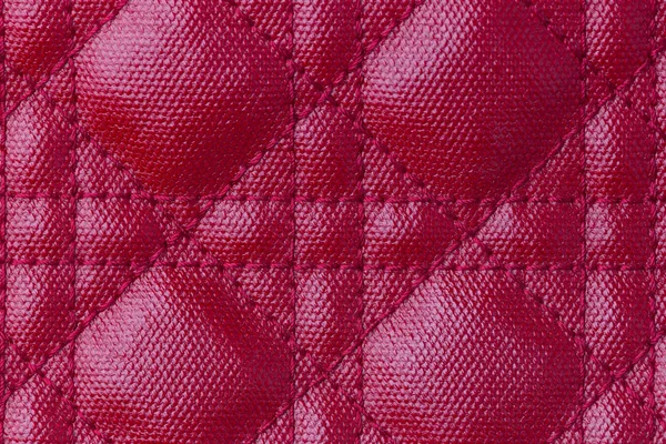 Närbild textrue av rött läder handväska — Stockfoto