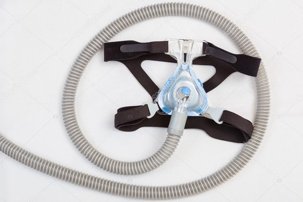 Sleep apnea headgear mask and hose — Stock Photo © cpoungpeth 114616484