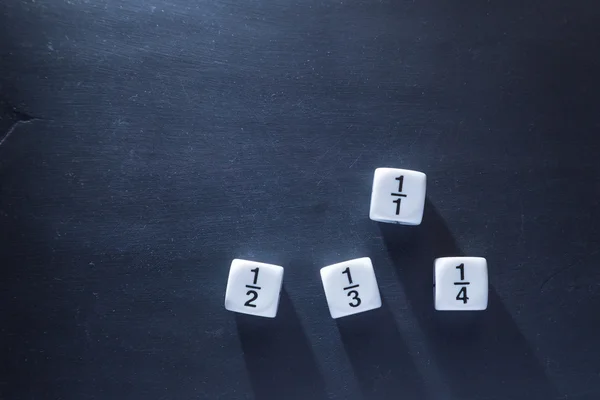 White fraction math number dices on blackboard, good for backgro — Stock Photo, Image