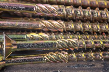 Torx 25 bit için kendi kendine dokunabilen yapısal vidalar. Yapı soyutlaması. Sanayi geçmişi.