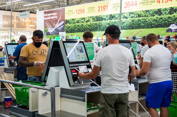 Voronezh, Russia - Juny 26, 2020: Purchase at self-service checkouts, Leroy-Merlin store, Voronezh