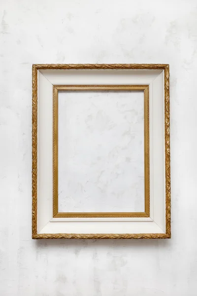 old frame on a white wall.