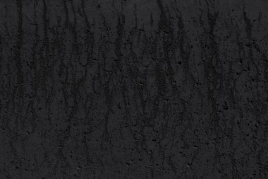 Lekeli siyah beton duvar. Grunge arkaplanı, doku