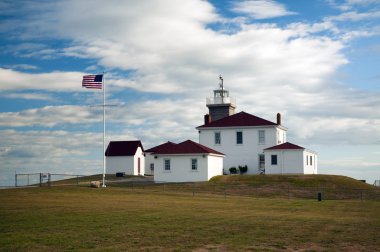 Historic Watch Hill Lighthouse on a Windy Summer Day in Rhode Island