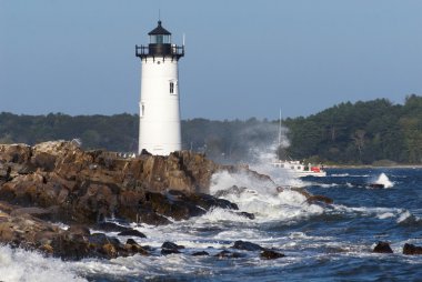 Portsmouth Lighthouse Guiding Fishing Boat in Rough Surf