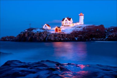 Maine's Nubble Lighthouse During Holiday Season clipart