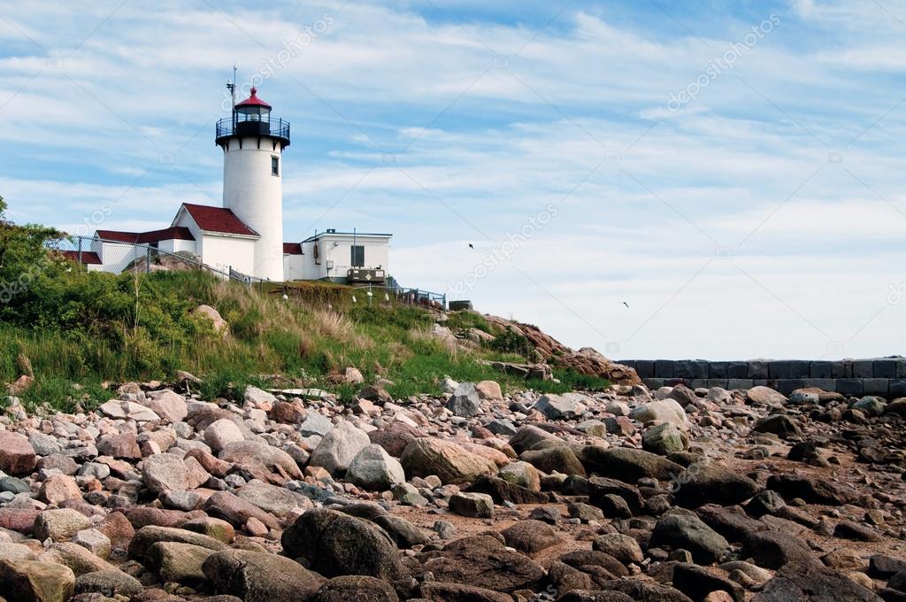 Gloucester Lighthouse Over Rocky Shore in Massachusetts