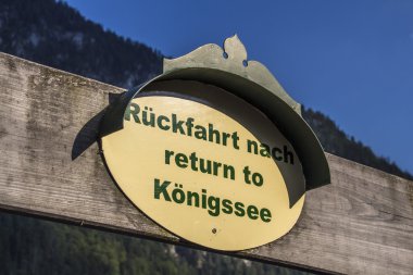 Sign at the Church of St. Bartholomew close to Berchtesgaden, Germany, 2015 clipart
