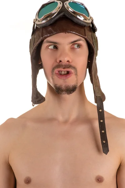 man in flight helmet and flying goggles