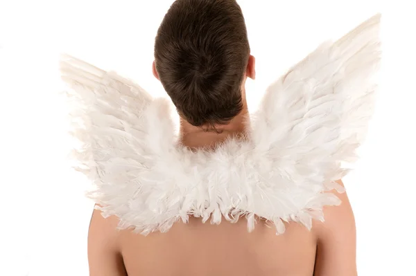 Homem com asas de anjo branco em suas costas olhando para cima — Fotografia de Stock