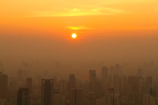 Aerial view of big city at misty sunrise morning