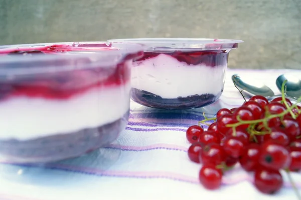 Parfait dessert with berries, milk souffle and jello layers. Treat in a glass. — Stock Photo, Image