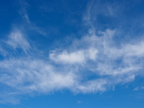 blue sky with light clouds