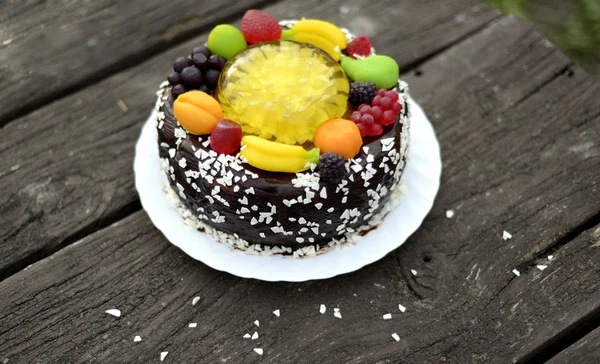 Chocolate cake with fruit — Stock Photo, Image