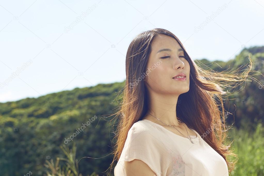 beauty in nature with wind blown hair
