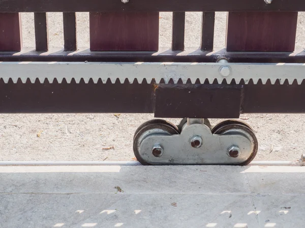 Steel wheel of automatic slide house gate — Stock Photo, Image