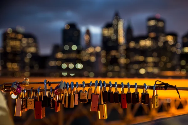 Love padlocks with city as a background — Stock Photo, Image