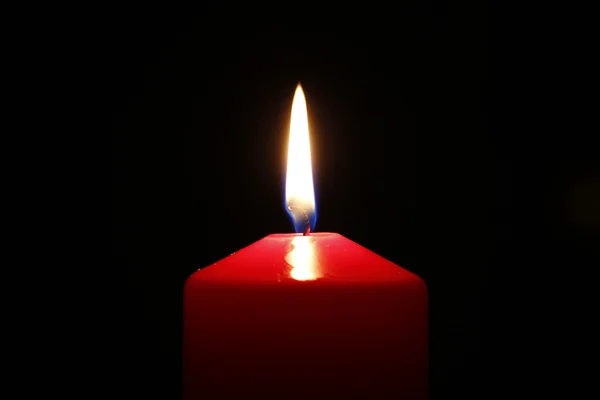 Candle flame in a dark background — Stock Photo, Image