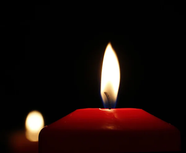 Two candle flames in a dark background — Stock Photo, Image