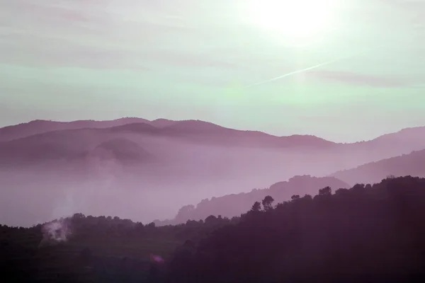 Foggy mountains in a winter morning — Stock Photo, Image