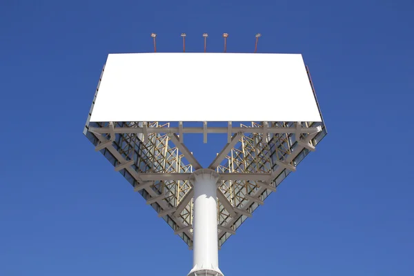 Blank billboard for advertising, against blue sky — Stock Photo, Image