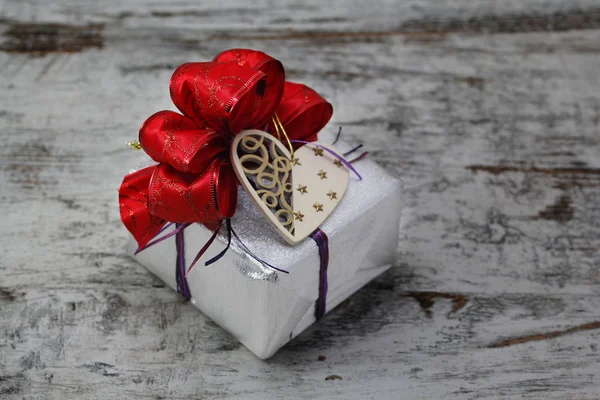Christmas gift box, with heart shape — Stock Photo, Image