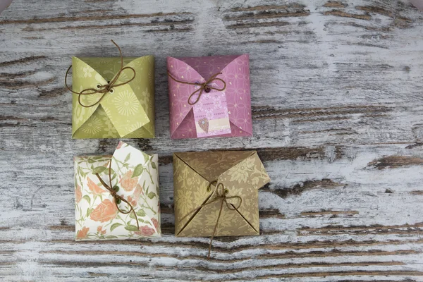 Four gift boxes, made of paper — Stock Photo, Image