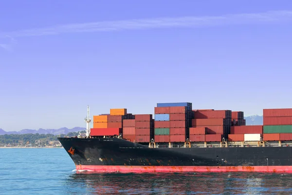 Container ship sailing, against blue sky — Stock Photo, Image