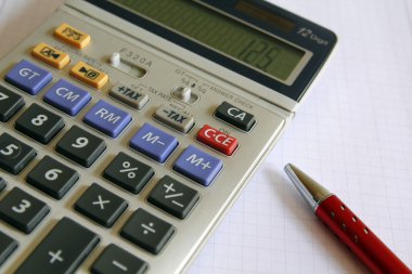 hesap makinesi ve kalem