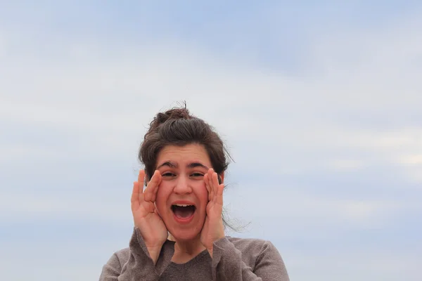 Young woman shouting