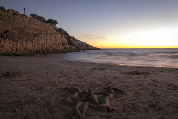 Salou strand bij zonsondergang — Stockfoto