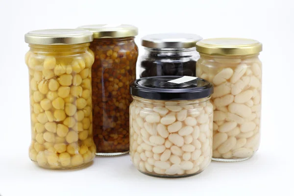 Verduras enlatadas en frascos de vidrio — Foto de Stock