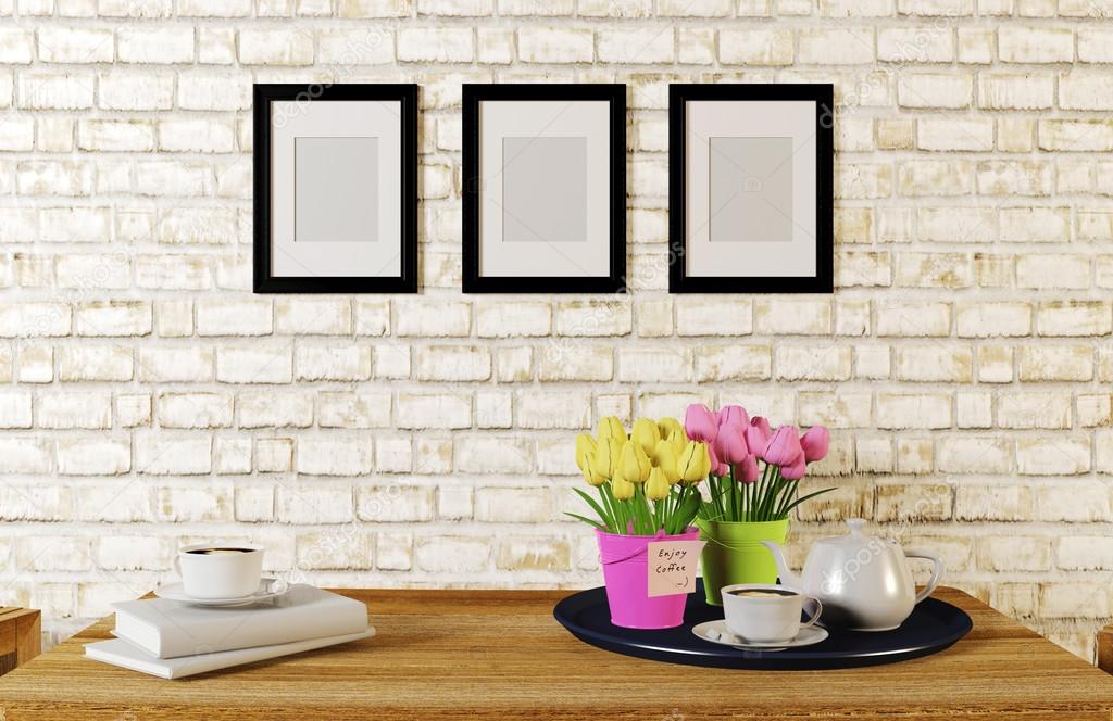 Coffee served on table in white brick room decorated with photo frames