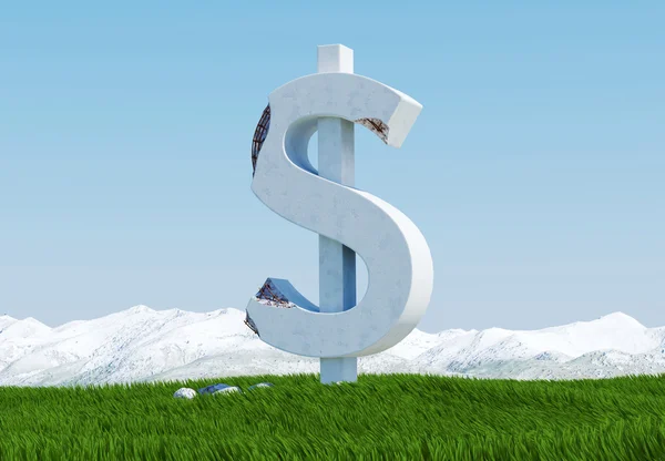 Poškozená socha konkrétní znak dolaru izolované na louce tráva s zasněžené hory a modrá obloha jako pozadí — Stock fotografie