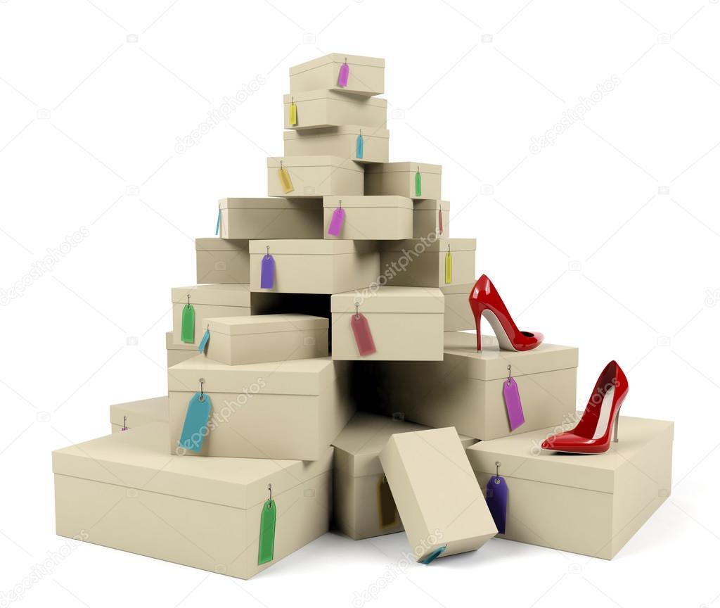 Pile of shoe boxes with red high-heeled shoes