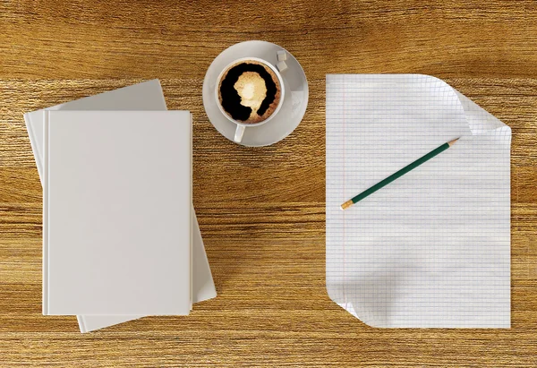 Xícara de café na mesa de trabalho com papel em branco e livros — Fotografia de Stock