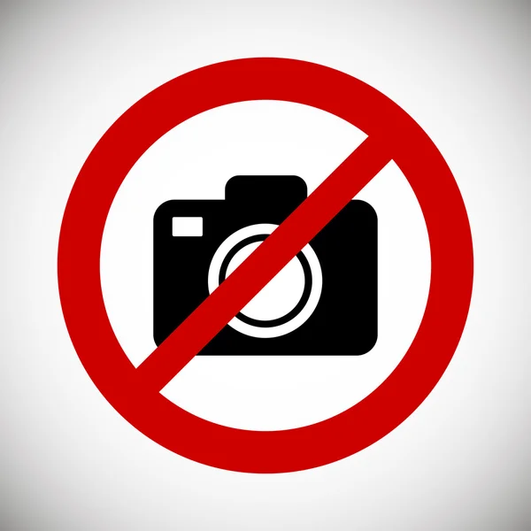 Kamera v červené zákaz na bílém pozadí. Žádná fotografie — Stockový vektor