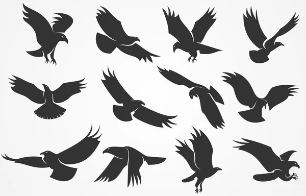 Silhouettes of eagles — Stock Vector